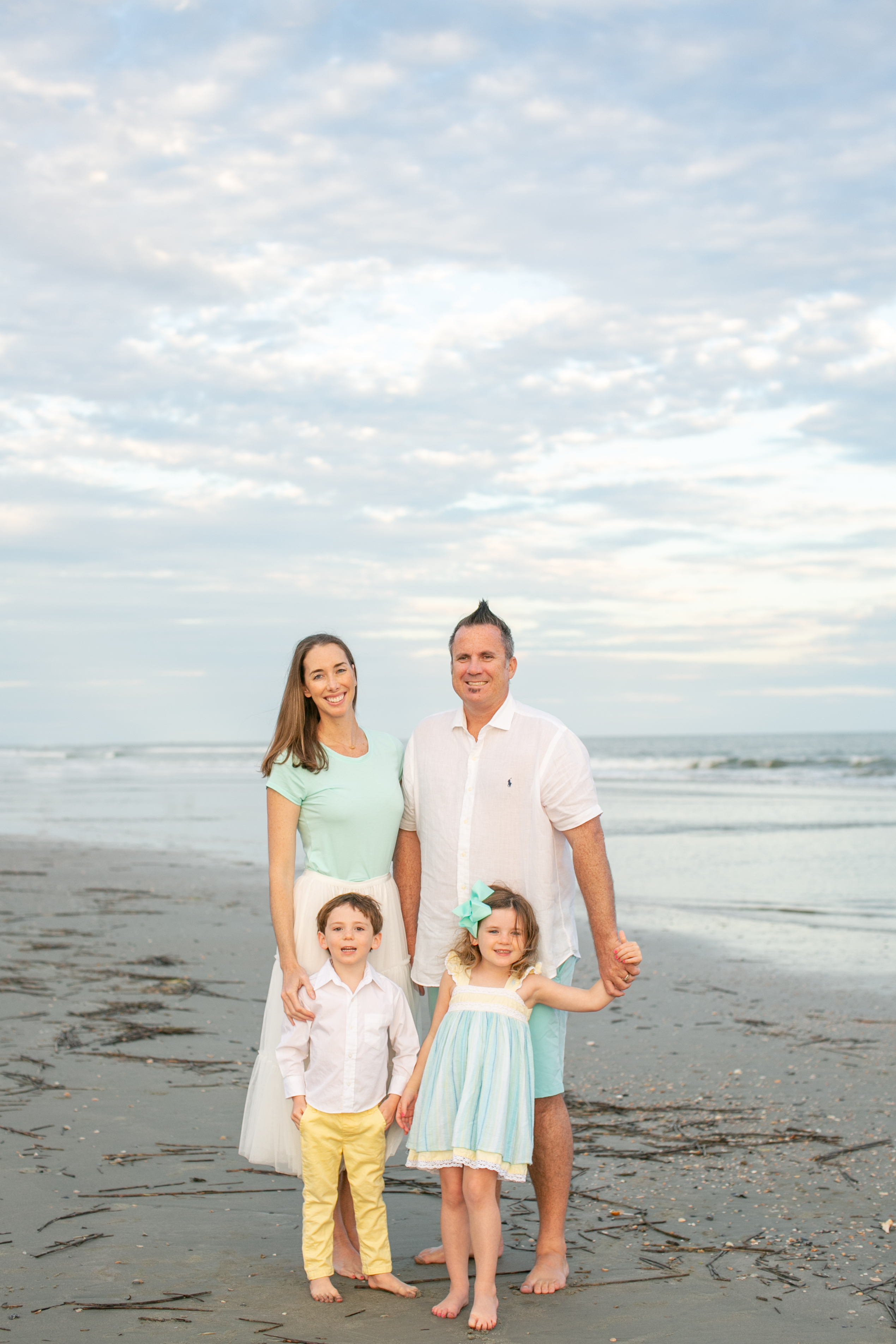 Dr. Leanne Tinsley Weston with her daughter on the beach